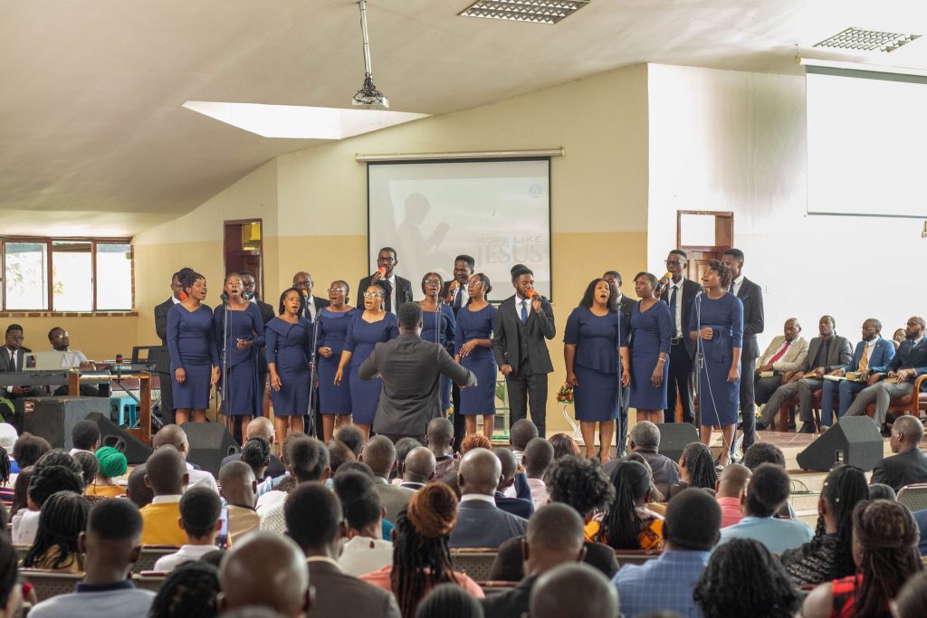 Maita singing at the 2025 theme launch